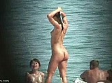 Voyeurism 7 :: Hidden beach cam catches hot nude babes in public