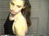 Voyeurism 8 :: Voyeur video of a teen girl trying on a dress for her prom